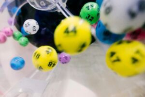 Lotto balls falling from a machine during a Lotto draw.